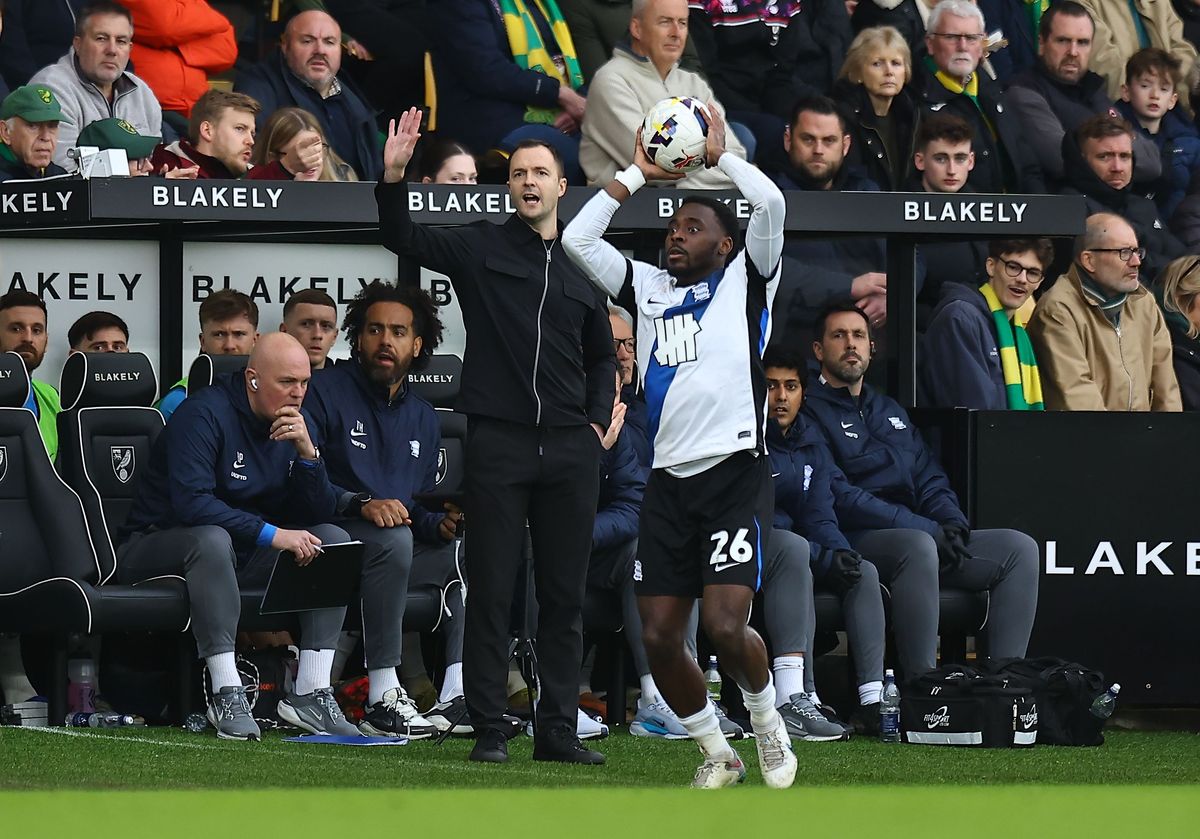 Birmingham City manager Chris Davies watches on as Bright Osayi-Samuel takes a throw-in