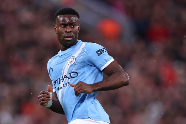 Marc Guehi in action for Man City.