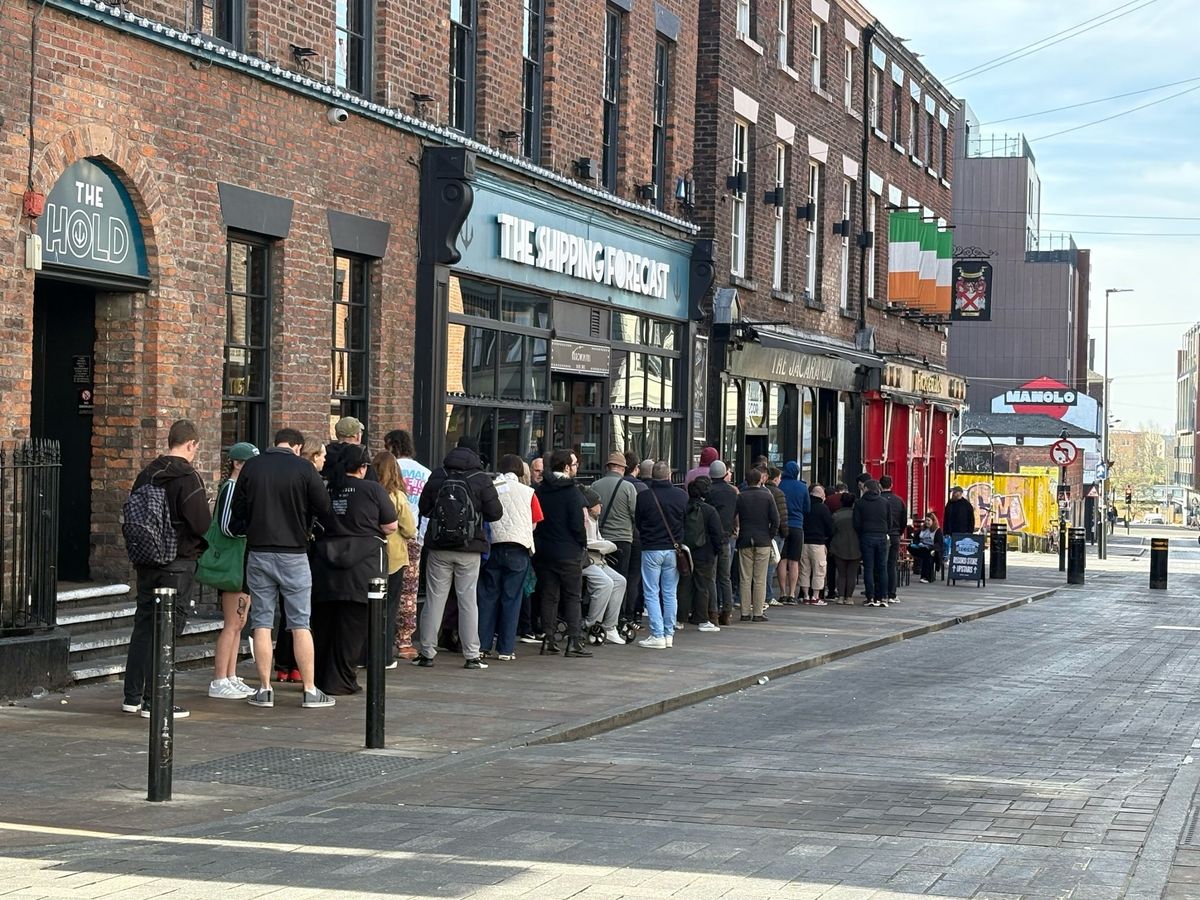 Queues outside The Jacaranda on Slater Street