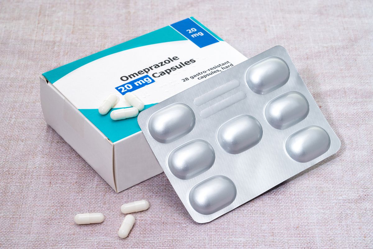 A box and blister pack of generic  Omeprazole pills