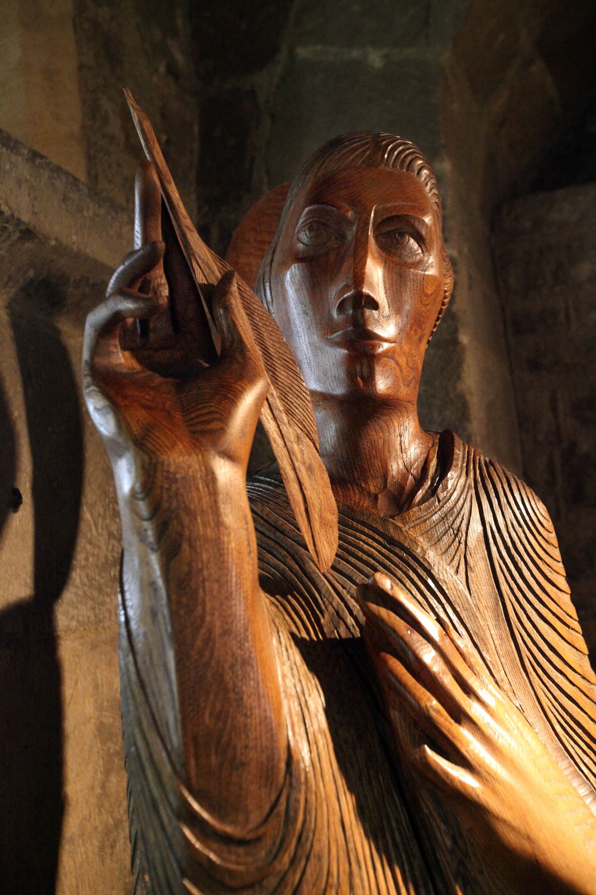 The statue of St, Bede by Fenwick Lawson at St. Paul's Church in Jarrow.