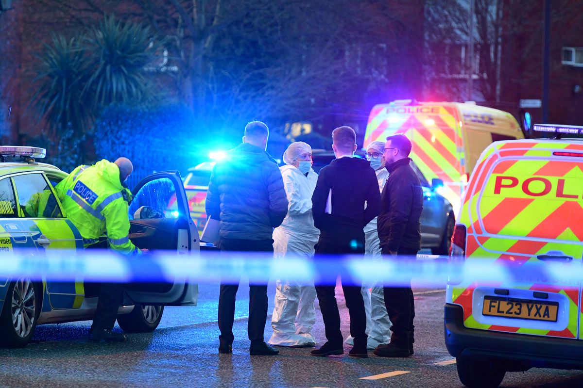 Police at the scene on Friday