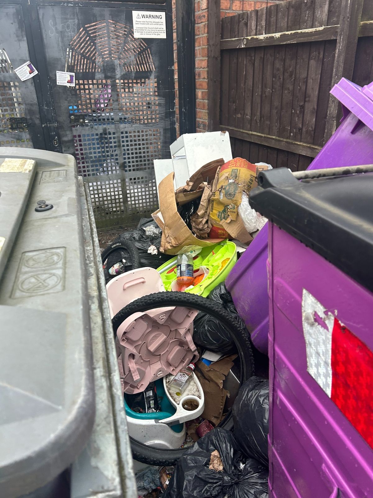 The alleyway next to Mr Cooper's home has become a hotspot for dumping rubbish