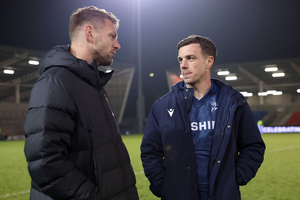 George Ford of Sale Sharks chats with Dan Biggar of RC Toulon following the Investec Champions Cup match between Sale Sharks and RC Toulon at Salford Community Stadium