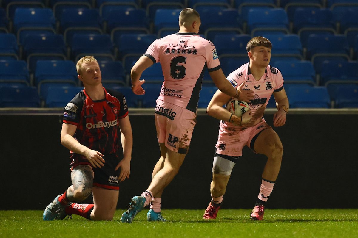 Hull FC's Davy Litten celebrates scoring a try