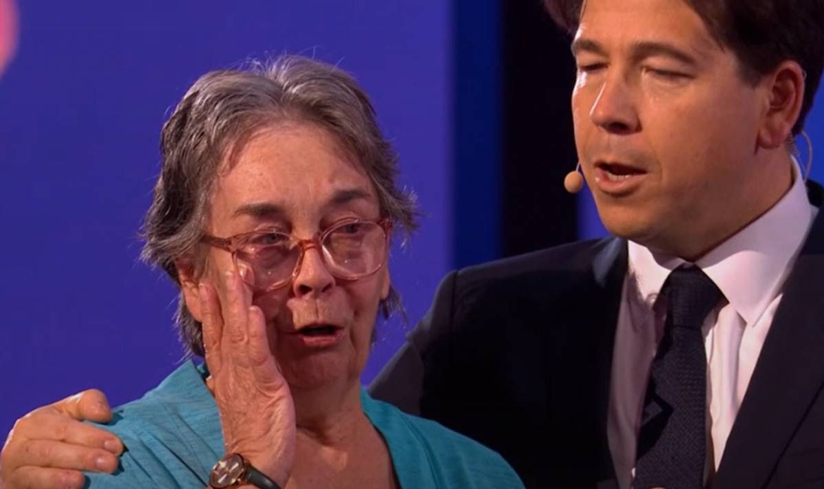 Michael McIntyre comforted Rylan Clark's former theatre school teacher Yvonne who welled up on stage. 