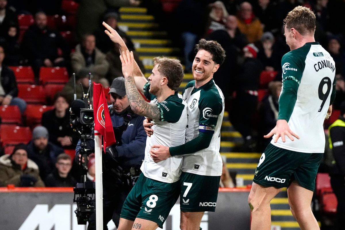 Middlesbrough's Riley McGree (left) celebrates scoring