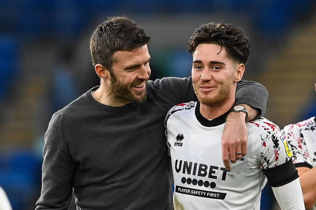 Middlesbrough head coach Michael Carrick celebrates with Hayden Hackney