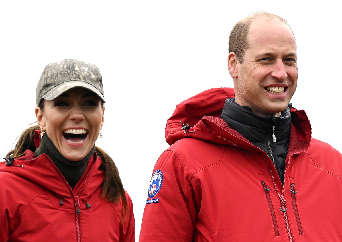 MERTHYR TYDFIL, WALES - APRIL 27: Catherine, Princess of Wales and Prince William, Prince of Wales laugh during their visit to the Central Beacons Mountain Rescue on day one of their visit to Wales on April 27, 2023 in Merthyr Tydfil, Wales. The Prince and Princess of Wales are visiting the country to celebrate the 60th anniversary of Central Beacons Mountain Rescue and to meet members of local communities. (Photo by Matthew Horwood - WPA Pool/Getty Images)