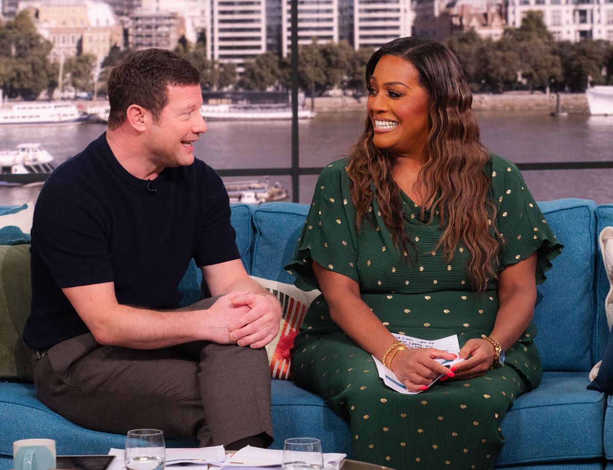 Dermot O'Leary and Alison Hammond sat beside each other on the This Morning sofa