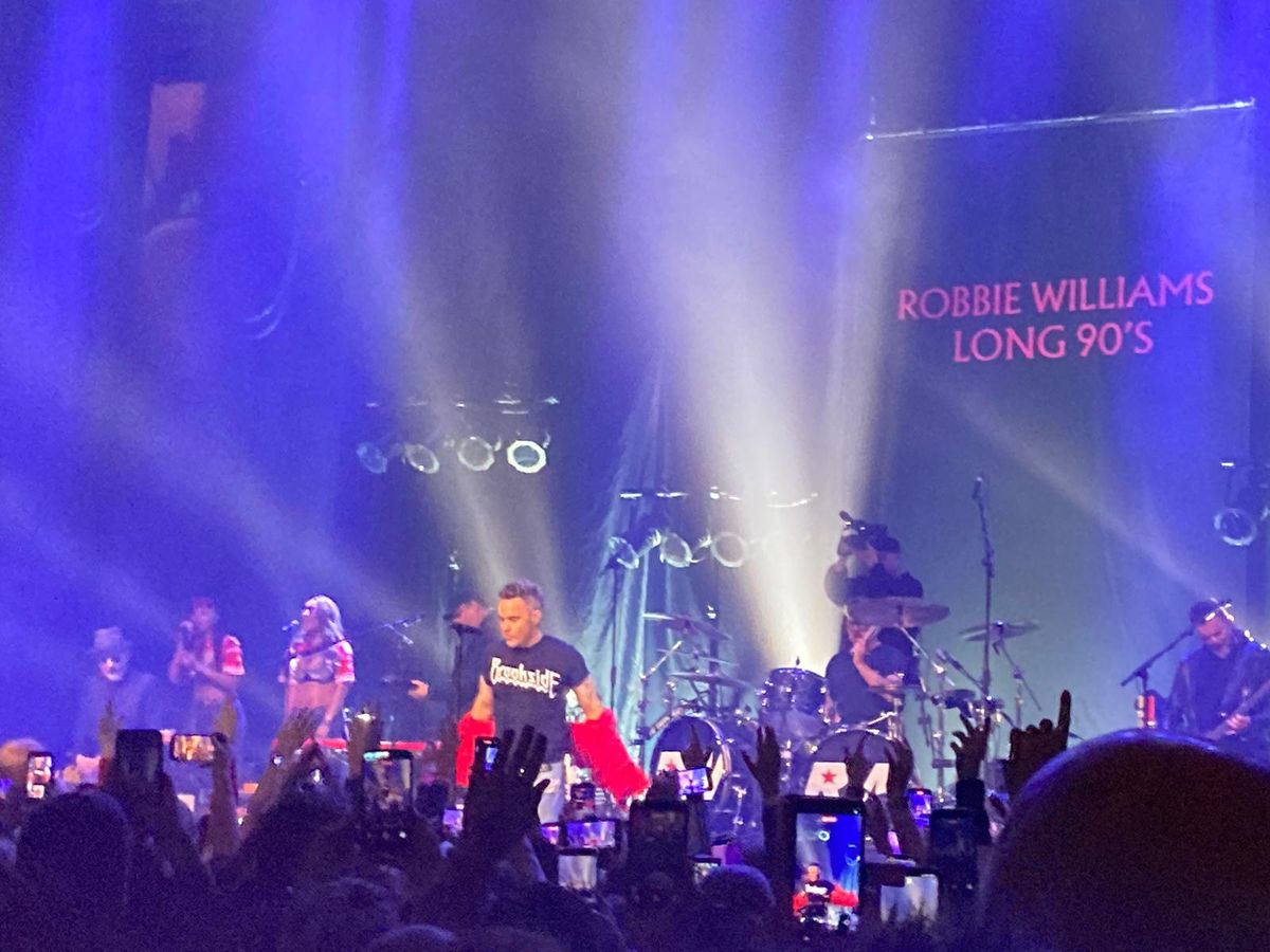 Robbie Williams on stage at the Olympia