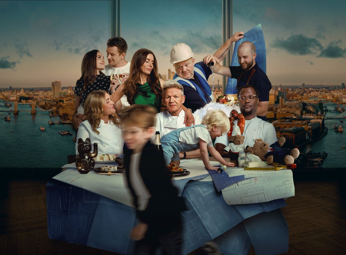 Gordon Ramsay poses with his family and staff in his new restaurant