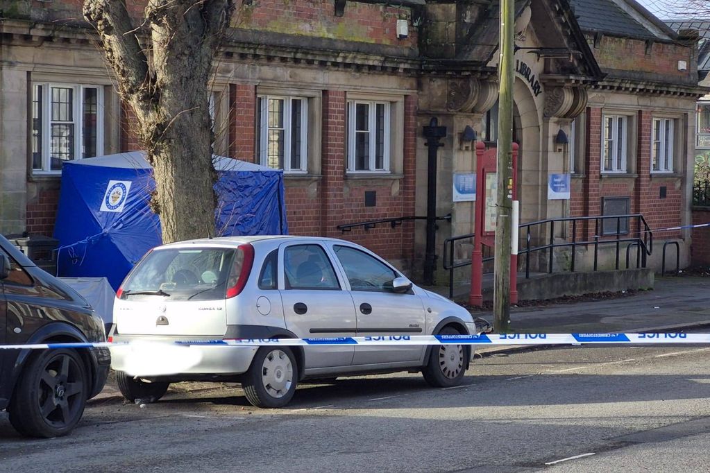 A blue tent is in place outside the Foleshill Library