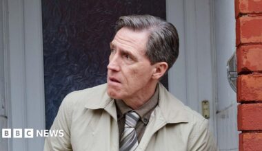 Uncle Bryn stood outside his front door