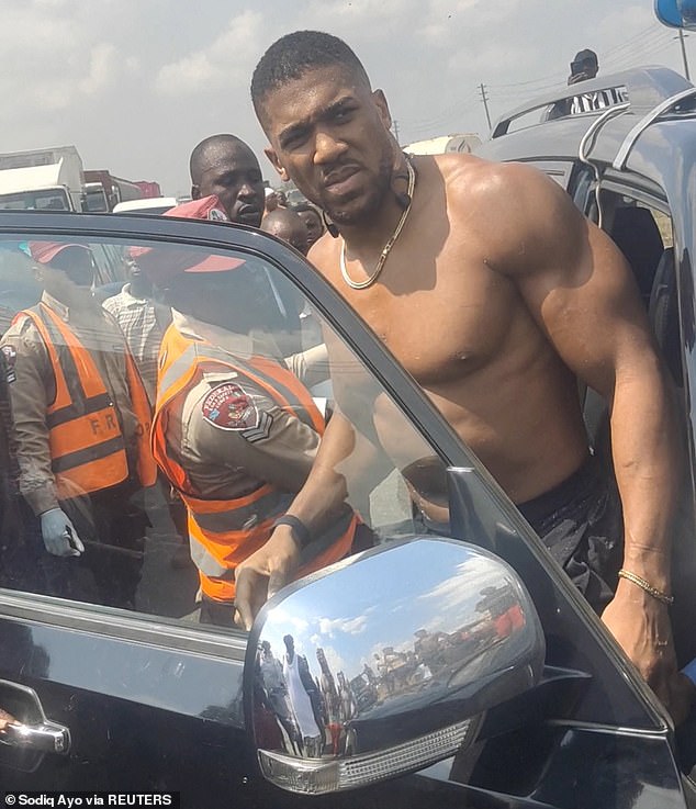 Joshua is pictured emerging from the car crash that claimed his friends' lives