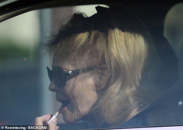 The Hollywood legend ensured she was ready for her close-up with the help of lip gloss