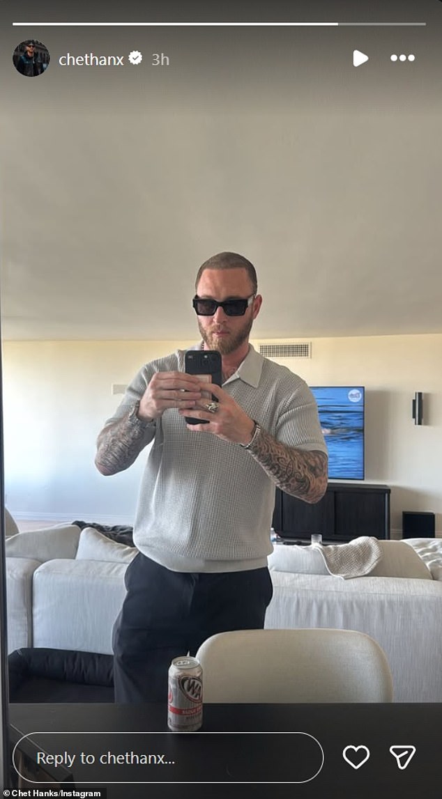 Hanks opted for black sunglasses, a beige short-sleeve top with black trousers and matching patent leather loafers