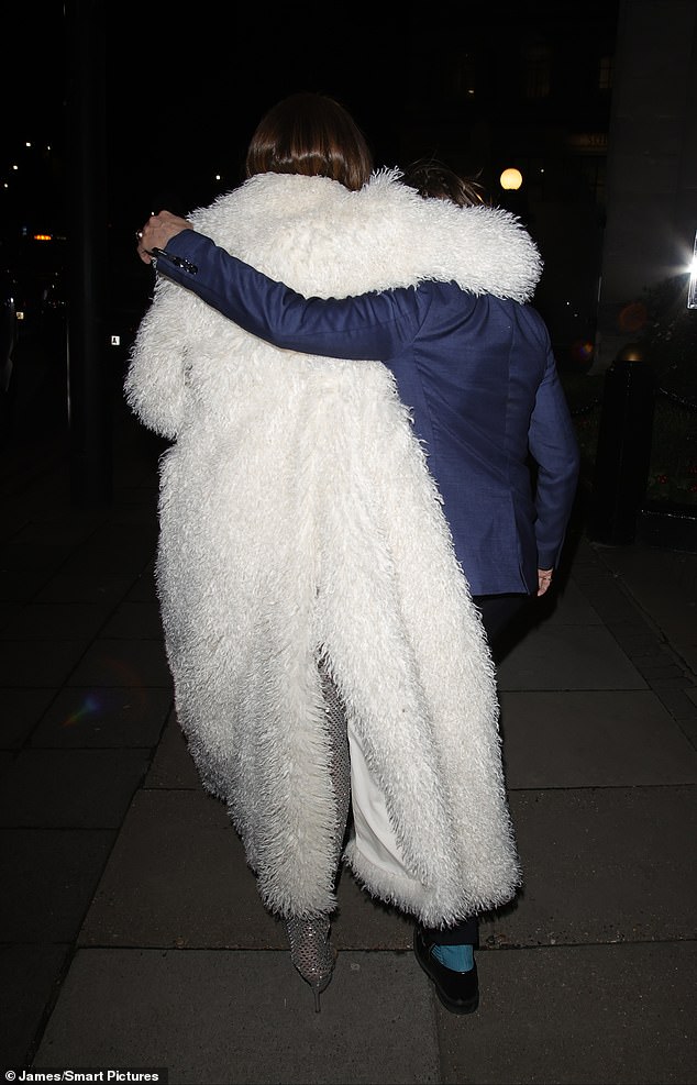 Michael who married Davina late last year after six years together, displayed his own snazzy sense of style in a bold blue trouser suit