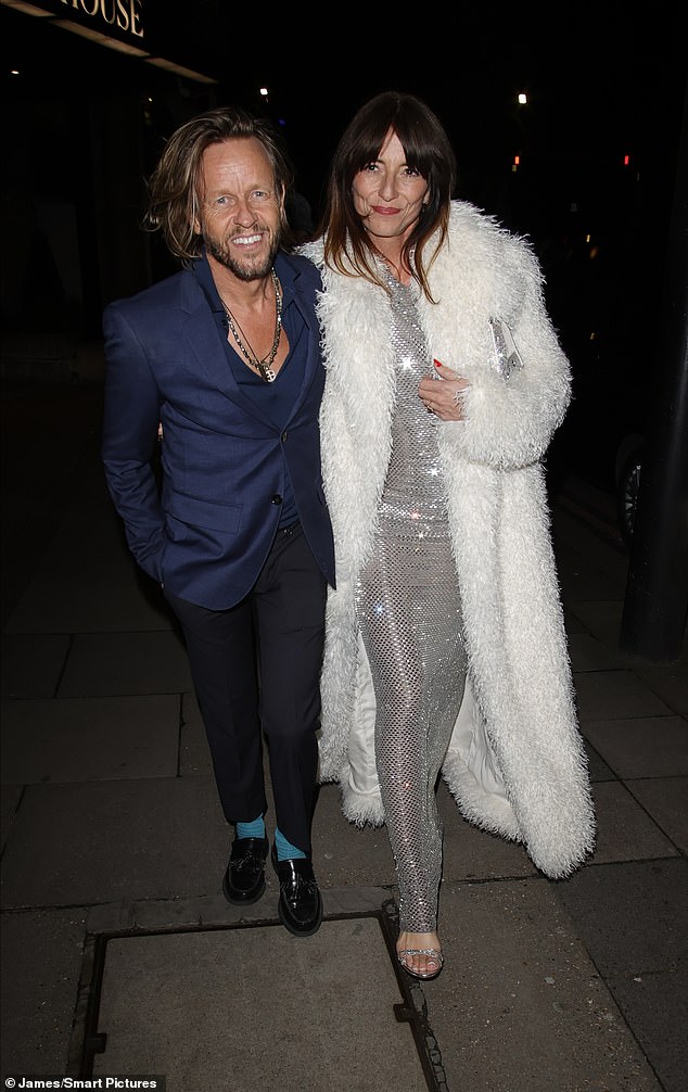 Davina McCall and her new husband Michael Douglaswere in high spirits as they headed home after attending the Broadcast Awards after party on Wednesday