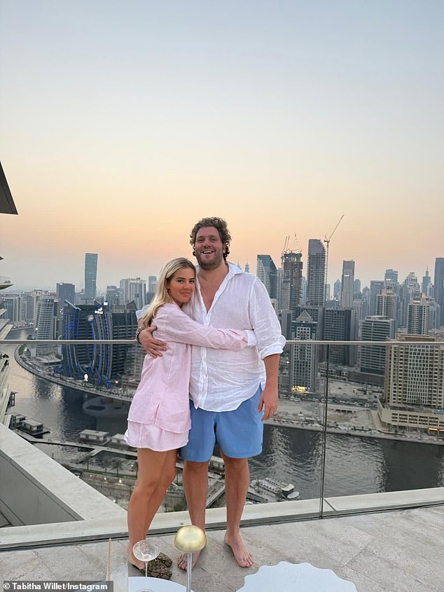 Tabitha and Harry were cuddled up together on a balcony