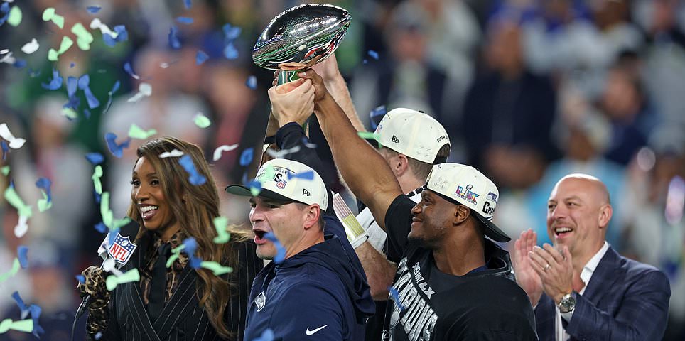 Seahawks stars begin wild celebrations after their Super Bowl win as devastated Patriots players flee the field