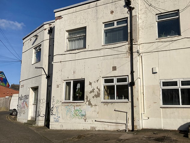 He is now living in a small bedsit in graffiti-covered converted flats in the Headingley area of Leeds (Pictured)