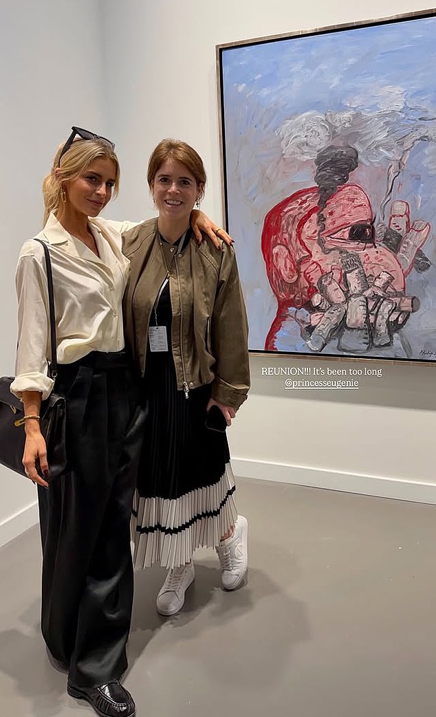 Eugenie is pictured with friend Caroline Daur, 30, working at an art fair in Qatar this week