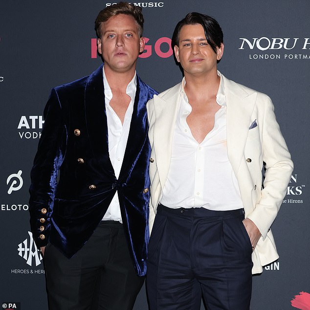 Ollie Locke and husband Gareth attending the Brit Awards afterparty in February 2023