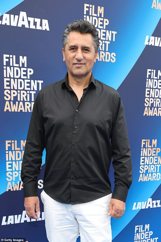 Cliff Curtis rocked a black button up and white pants
