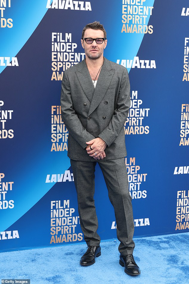 Australian hunk Joel Edgerton, 51, cut a dapper figure in a grey suit