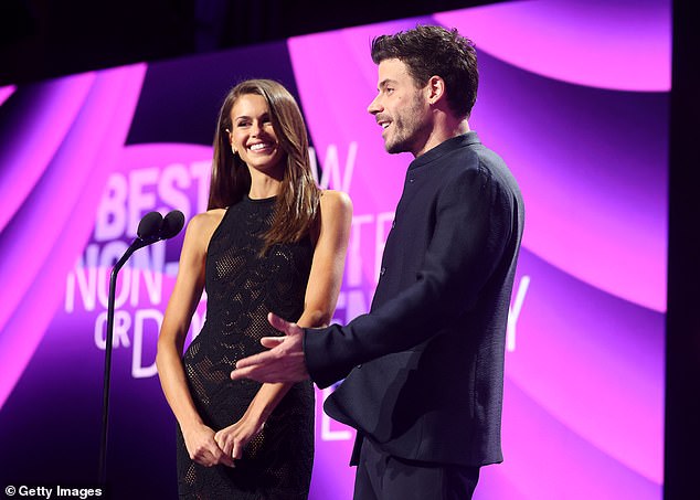 Arnaud sported a dark suit