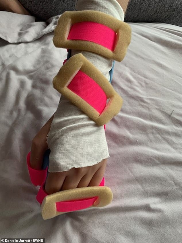 Doctors tried to remove Danielle’s implant for two hours, before telling her that they couldn’t and would have to leave it where it was. She said at the time: ‘I can’t use a knife and fork. I have to get someone else to cut up my food’