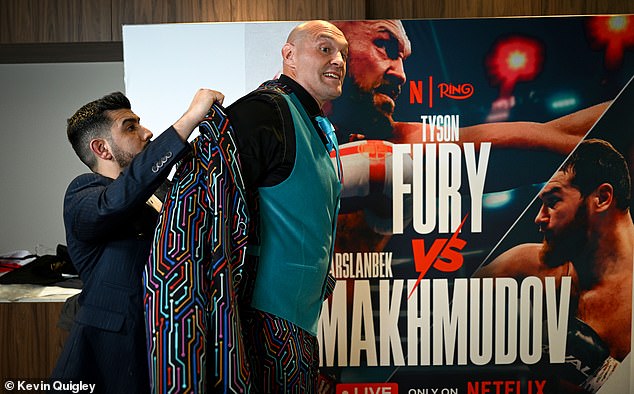 Fury gets ready with Claudio Lugli founder Navid Salimian in what has become a tradition