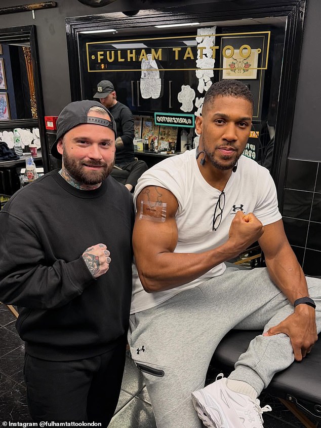 AJ got a new tattoo on his arm last week - featuring the names of Sina Ghami and Latif 'Latz' Ayodele