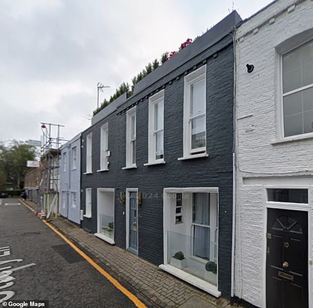 Tall planters on top of the £2.5million home in Notting Hill have been ordered to be removed following a bitter neighbourhood dispute