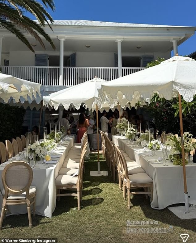 Guests enjoyed the extravagant wedding breakfast at large banquet tables, under frilled sun umbrellas