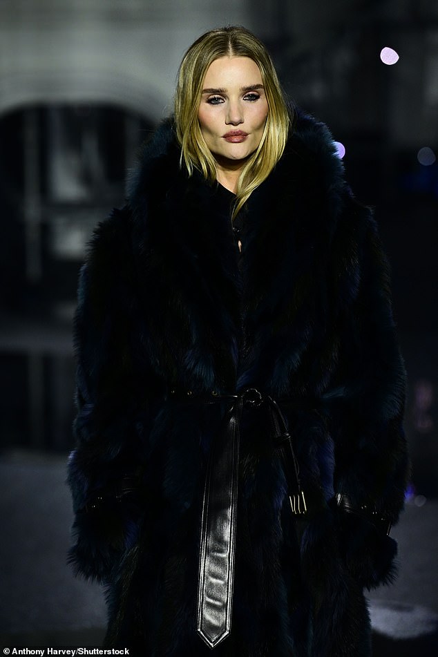 The Plymouth-born supermodel looked impeccable in a glamorous black maxi fur