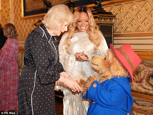 Queen Camilla was introduced to Paddington Bear during a reception for young writers at Windsor Castle