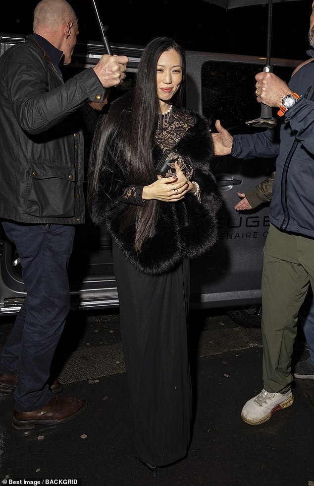 Jim was joined by his rarely-seen partner Min Ah, 32, who cut a glamorous appearance in a black lace gown