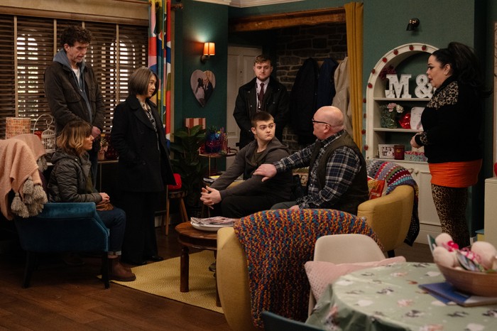 17_02_emm_police_update Police stand over Marlon, Rhona, Paddy, Mandy and Dylan in a scene from Emmerdale