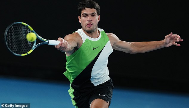 MELBOURNE, AUSTRALIA - FEBRUARY 1: Carlos Alcaraz of Spain returns a shot in the Men's Singles Final match against Novak Djokovic of Serbia during day 15 of the 2026 Australian Open at Melbourne Park on February 1, 2026 in Melbourne, Australia. (Photo by Fred Lee/Getty Images)