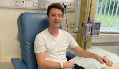 A smiling family of 4 on a walk