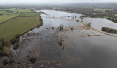 Floodwater cover fields near to Harbridge in Hampshire. Pic: PA