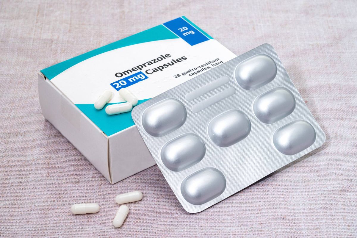 A box and blister pack of generic  Omeprazole pills