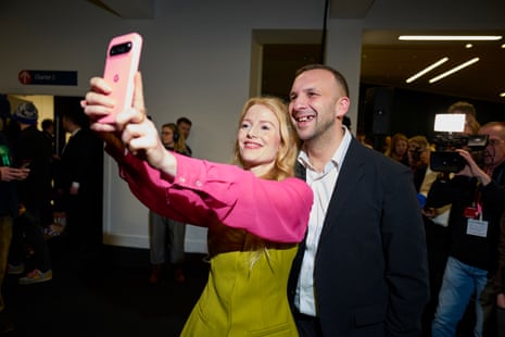 Zack Polanski posing for a selfie with the new Green party MP for Gorton and Denton, Hannah Spencer.