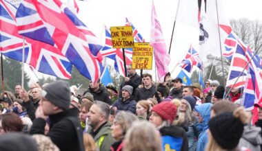 People take part in a protest in Crowborough after the first 27 illegal migrants were moved into Crowborough Training Camp. Pic: PA