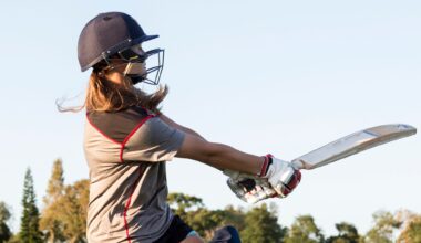 Someone swinging a cricket bat.