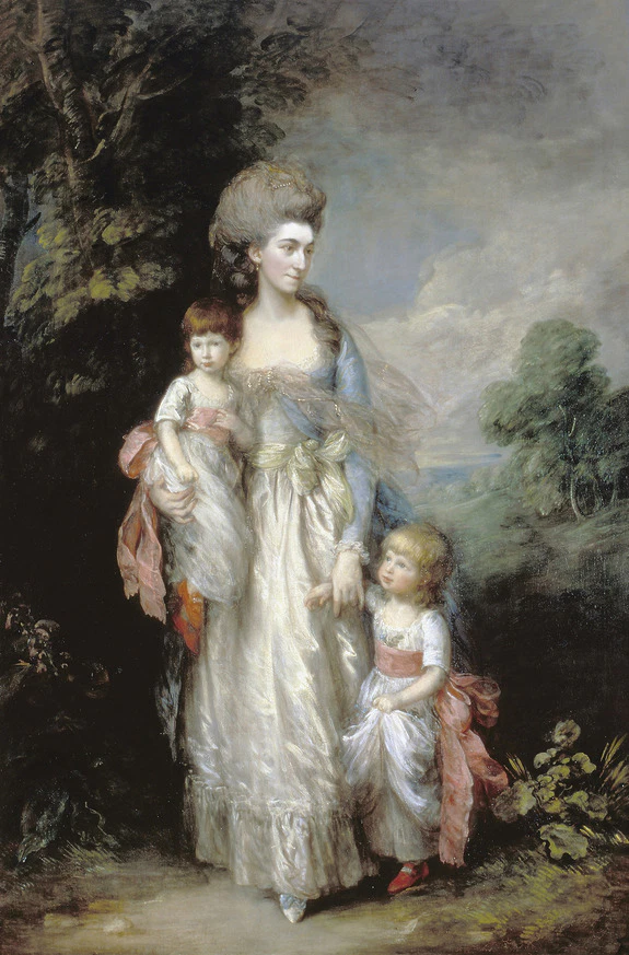 A woman in 18th-century attire poses outdoors with two children, surrounded by trees and countryside scenery.