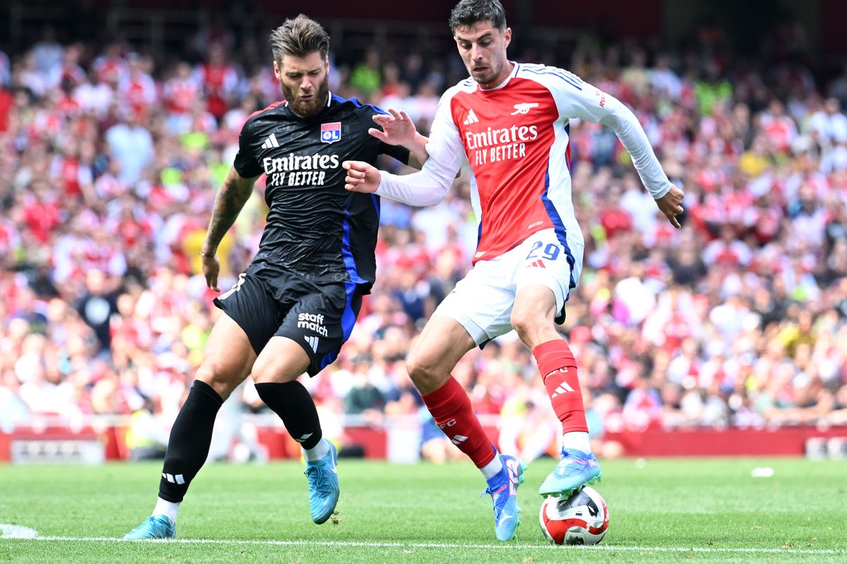 Kai Havertz of Arsenal turns away from Duje Caleta-Car of Lyon during the pre season match between Arsenal and Olympique Lyonnais at Emirates Stadium