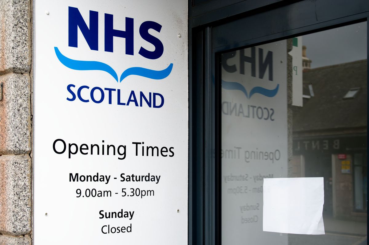 Glasgow, UK, April 21st 2025, NHS clinic opening times in hours and days at patient entrance